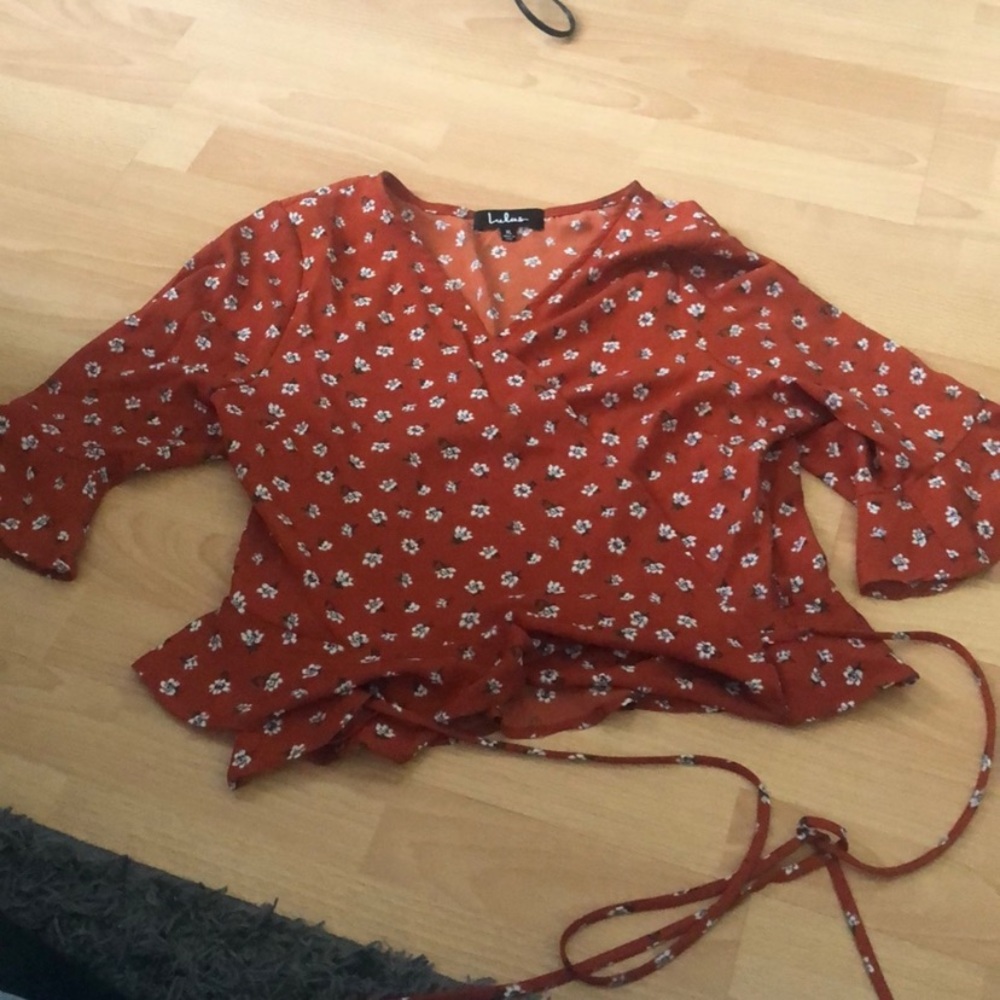 Red floral wrap top